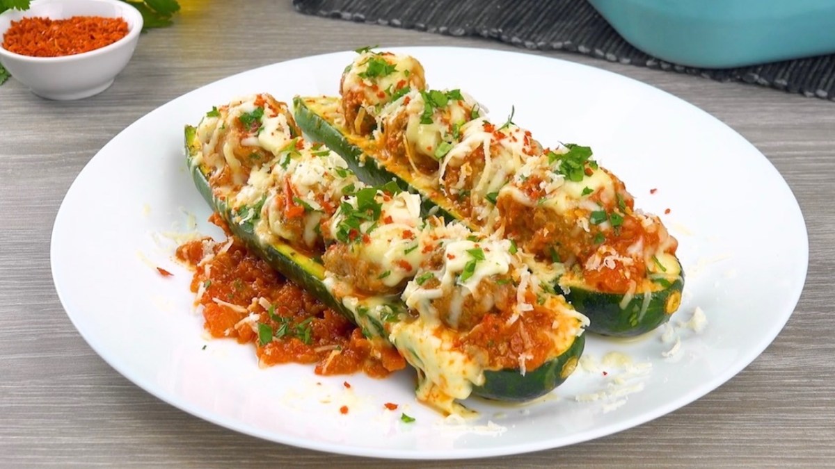 Cheese Baked Zucchini Boats Filled With Meatballs & Marinara Sauce